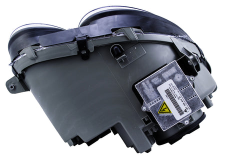 HELLA Headlight Assembly - 007988551