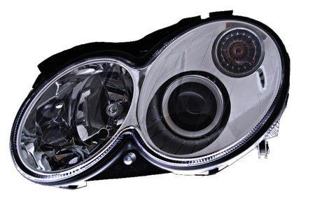 HELLA Headlight Assembly - 007988551