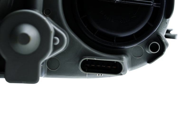 HELLA Headlight Assembly - 007988551