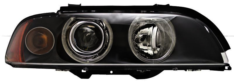HELLA Headlight Assembly - 008052121