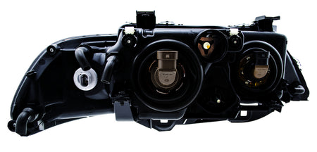 HELLA Headlight Assembly - 008053051