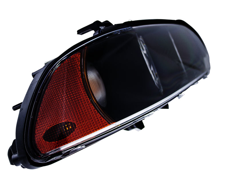 HELLA Headlight Assembly - 008053121