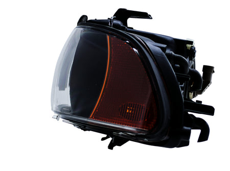 HELLA Headlight Assembly - 008053121