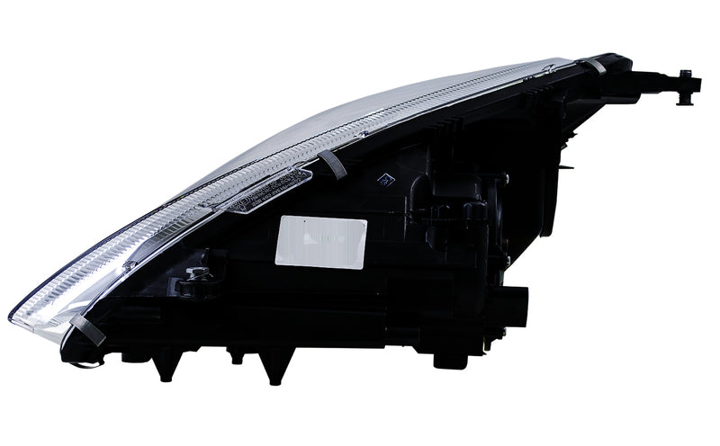HELLA Headlight Assembly - 008361661
