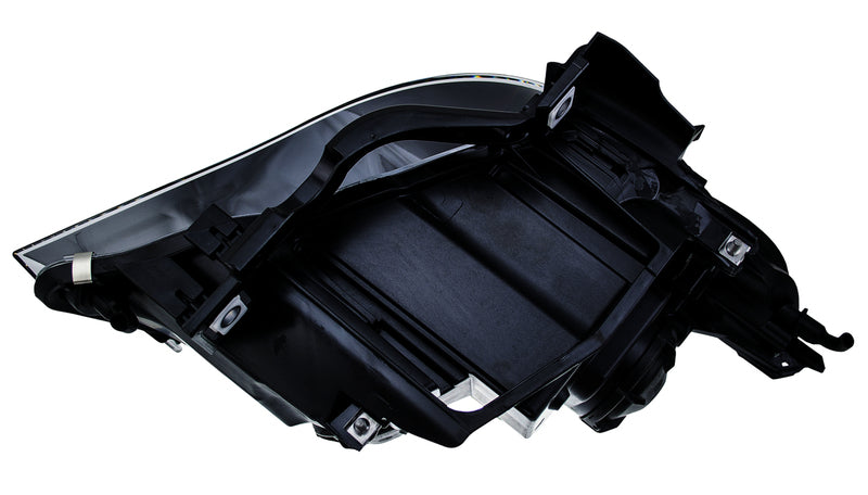 HELLA Headlight Assembly - 008673111