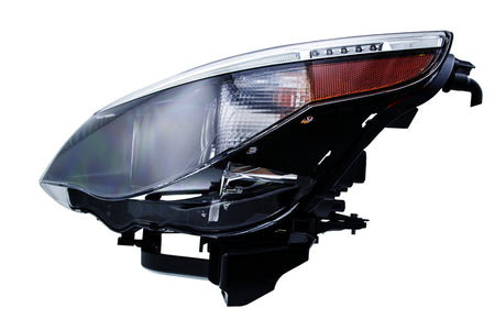 HELLA Headlight Assembly - 008673111