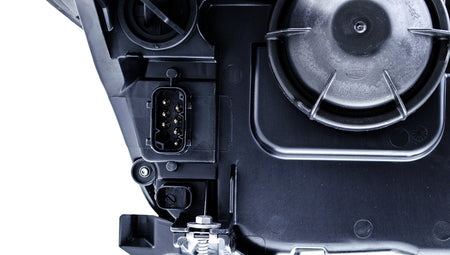 HELLA Headlight Assembly - 008673111