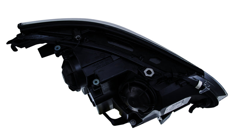 HELLA Headlight Assembly - 008673111