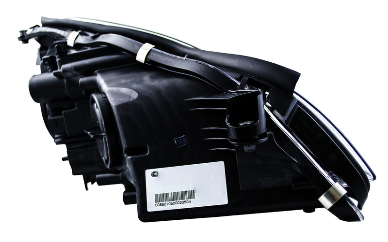 HELLA Headlight Assembly - 008821051