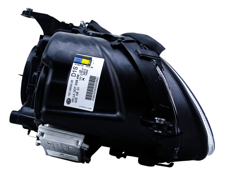 HELLA Headlight Assembly - 009040351