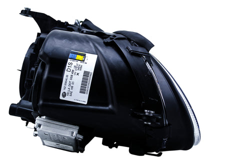HELLA Headlight Assembly - 009040351