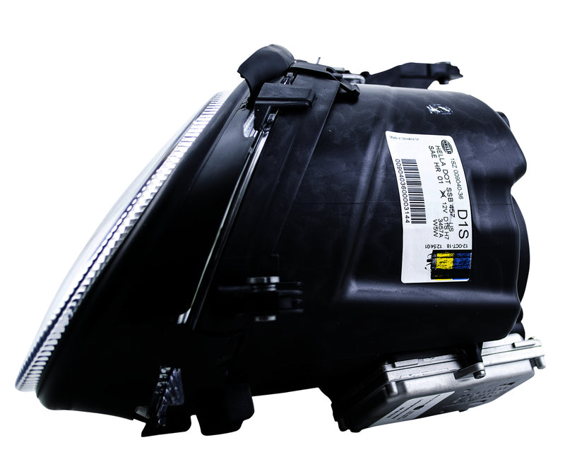 HELLA Headlight Assembly - 009040361