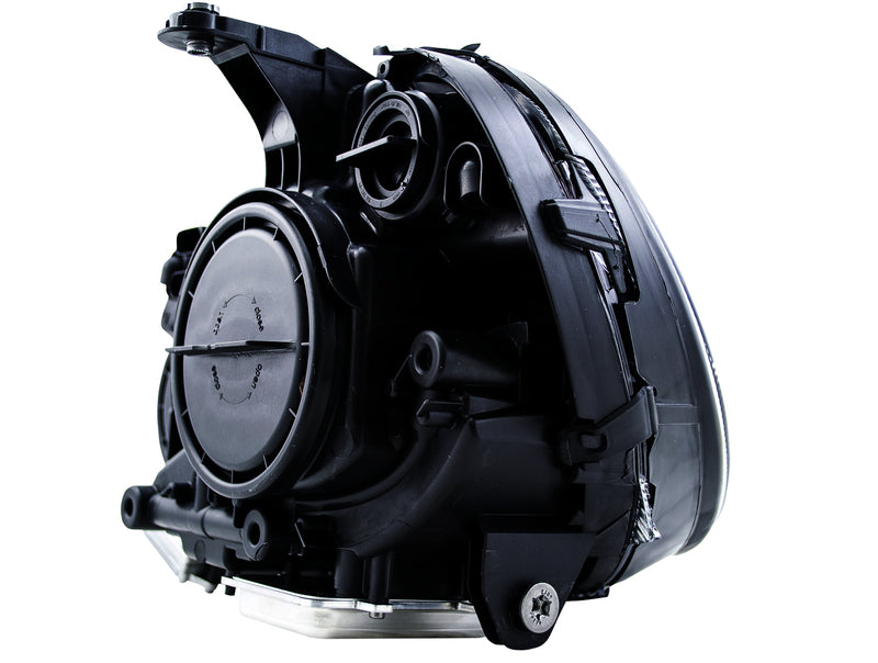 HELLA Headlight Assembly - 009040361
