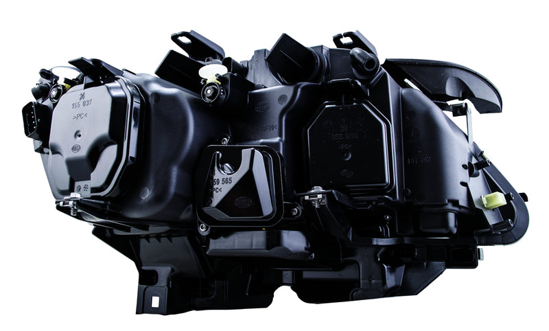 HELLA Headlight Assembly - 009044531