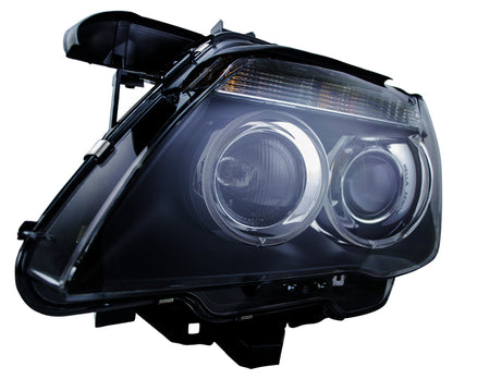 HELLA Headlight Assembly - 009044531
