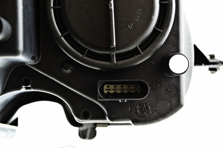 HELLA Headlight Assembly - 009260051