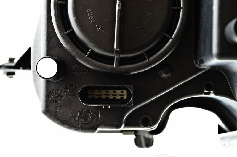 HELLA Headlight Assembly - 009260061