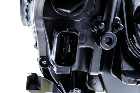 HELLA Headlight Assembly - 009449051