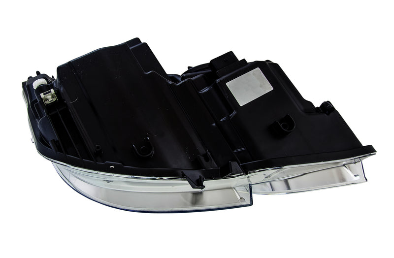 HELLA Headlight Assembly - 009647981