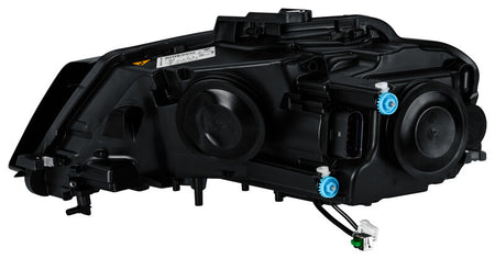 HELLA Headlight Assembly - 009648401