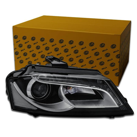 HELLA Headlight Assembly - 009648401