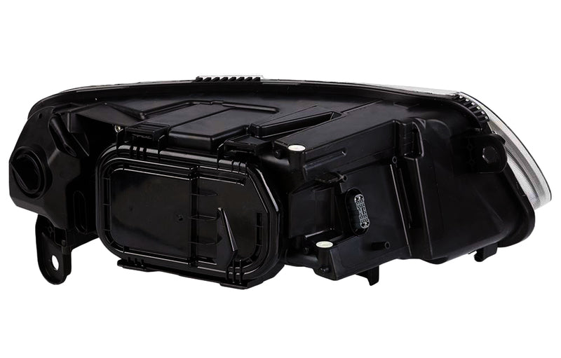 HELLA Headlight Assembly - 009701151