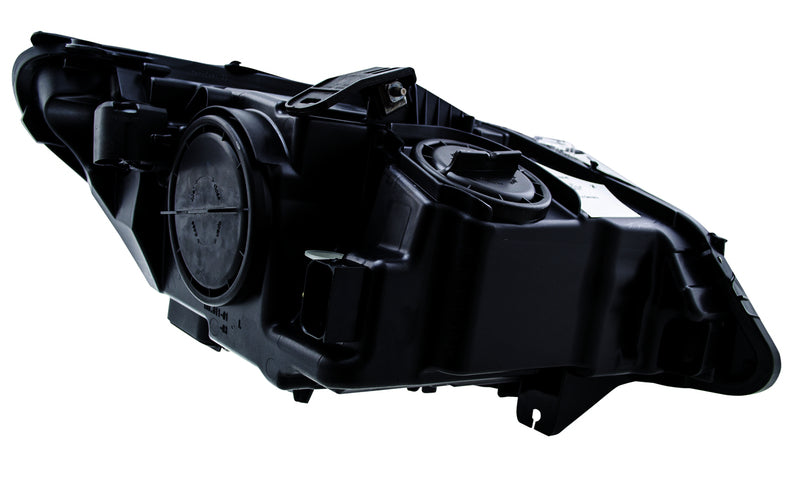 HELLA Headlight Assembly - 009934451