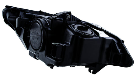 HELLA Headlight Assembly - 009934451