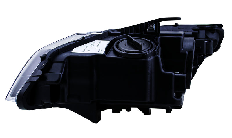 HELLA Headlight Assembly - 009934461