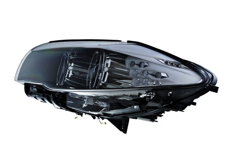 HELLA Headlight Assembly - 010131651