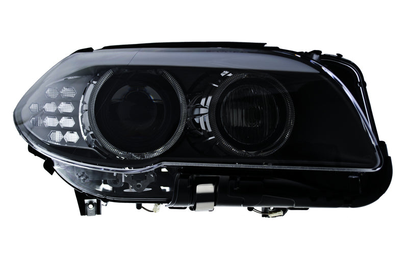 HELLA Headlight Assembly - 010131661