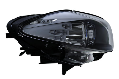 HELLA Headlight Assembly - 010131661