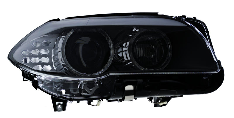 HELLA Headlight Assembly - 010131661