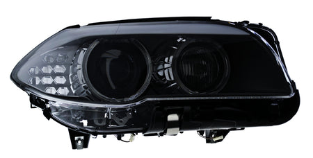 HELLA Headlight Assembly - 010131661