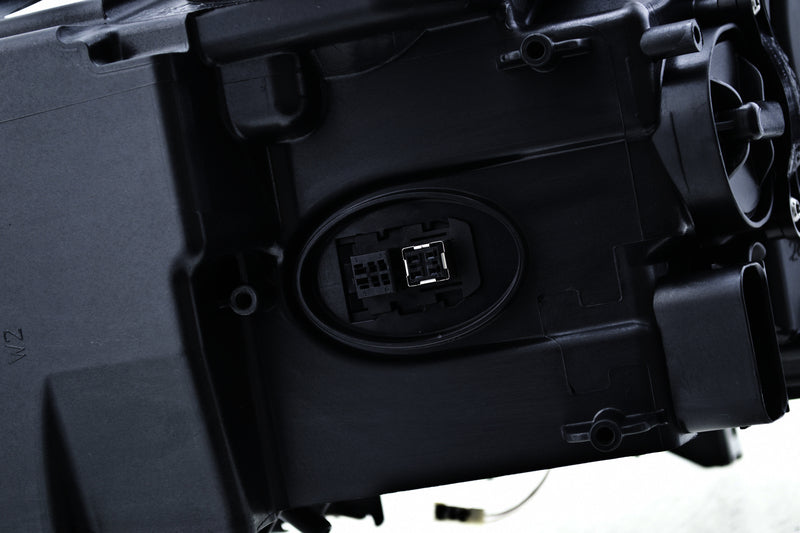 HELLA Headlight Assembly - 010131661