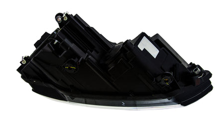 HELLA Headlight Assembly - 010395361