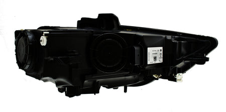 HELLA Headlight Assembly - 010740351