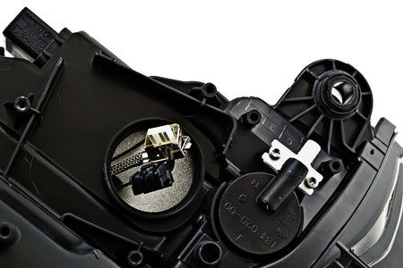 HELLA Headlight Assembly - 010740351
