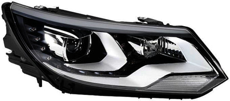 HELLA Headlight Assembly - 010748361