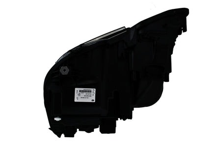 HELLA Headlight Assembly - 010800081