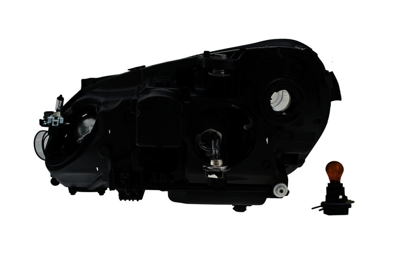 HELLA Headlight Assembly - 010800081