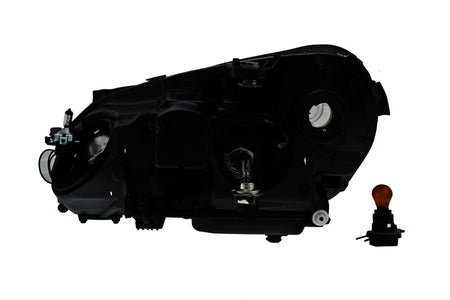 HELLA Headlight Assembly - 010800081