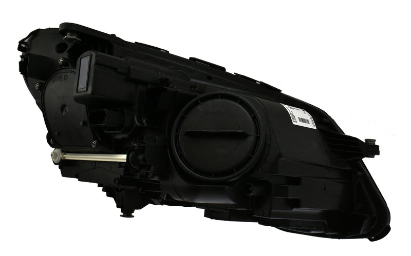 HELLA Headlight Assembly - 011066651