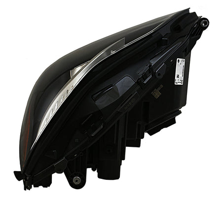 HELLA Headlight Assembly - 011066651