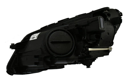 HELLA Headlight Assembly - 011066661
