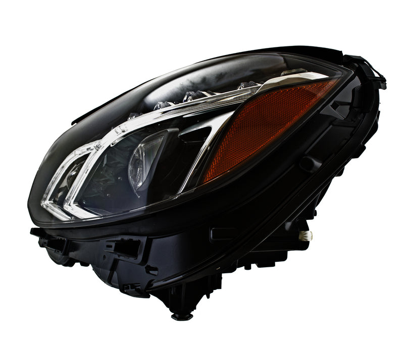 HELLA Headlight Assembly - 011066711