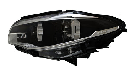 HELLA Headlight Assembly - 011072951