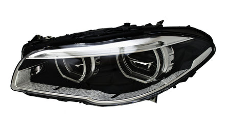 HELLA Headlight Assembly - 011072951