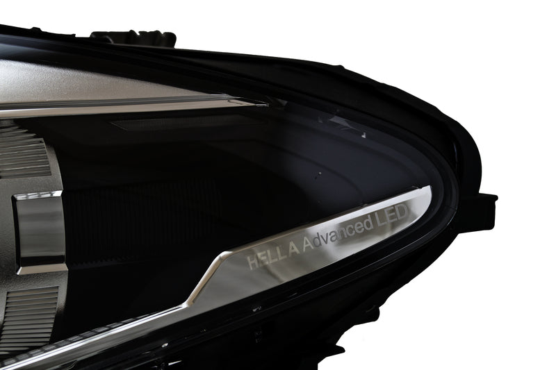 HELLA Headlight Assembly - 011072951
