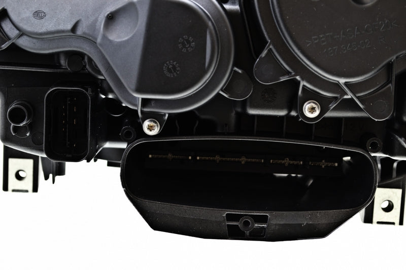HELLA Headlight Assembly - 011072961